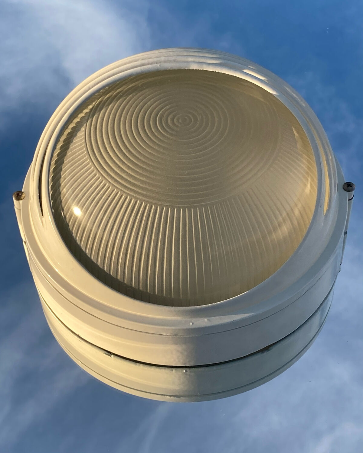 Designer metal wall light