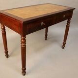 Bureau plat en acajou xixème dessus cuir