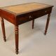 Bureau plat en acajou xixème dessus cuir