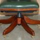 Modern captain's chair in leather, beech frame, adjustable.