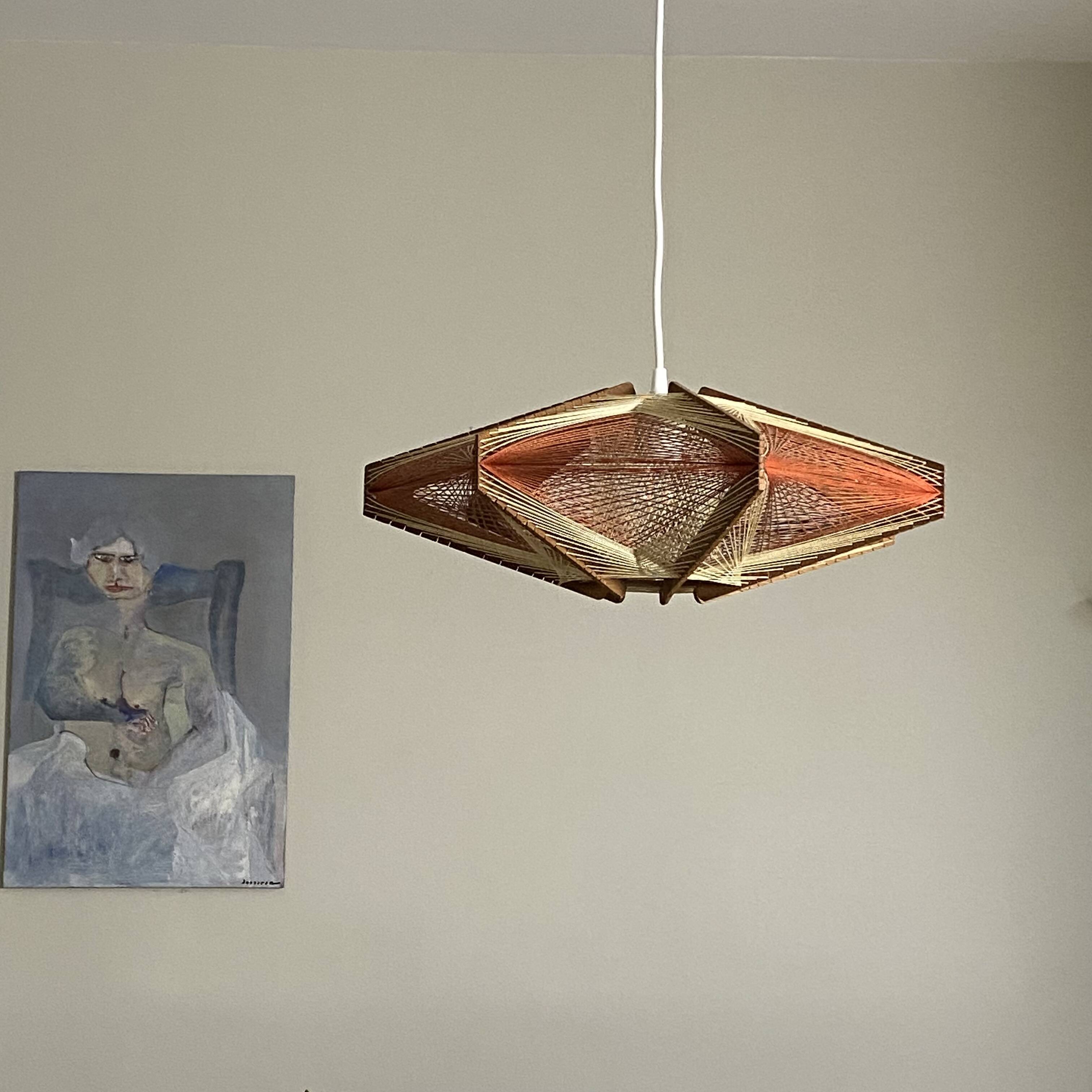 Vintage Scandinavian pendant light with stretched wires.