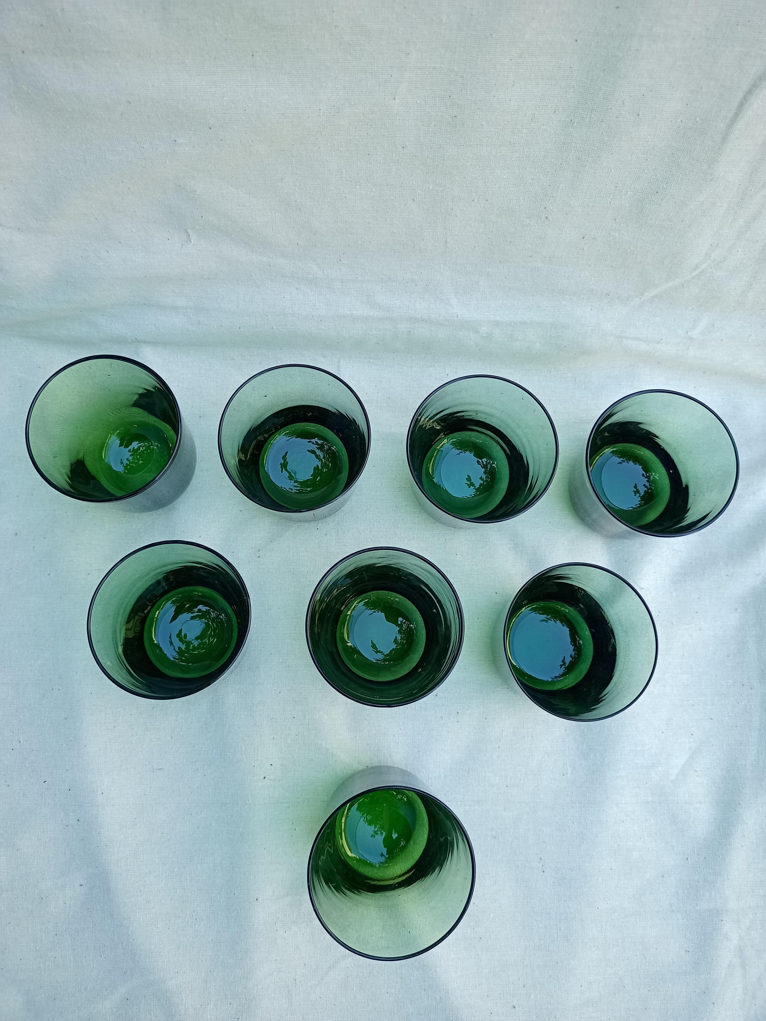 Vintage glasses in slightly bulled green glass