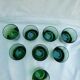 Vintage glasses in slightly bulled green glass