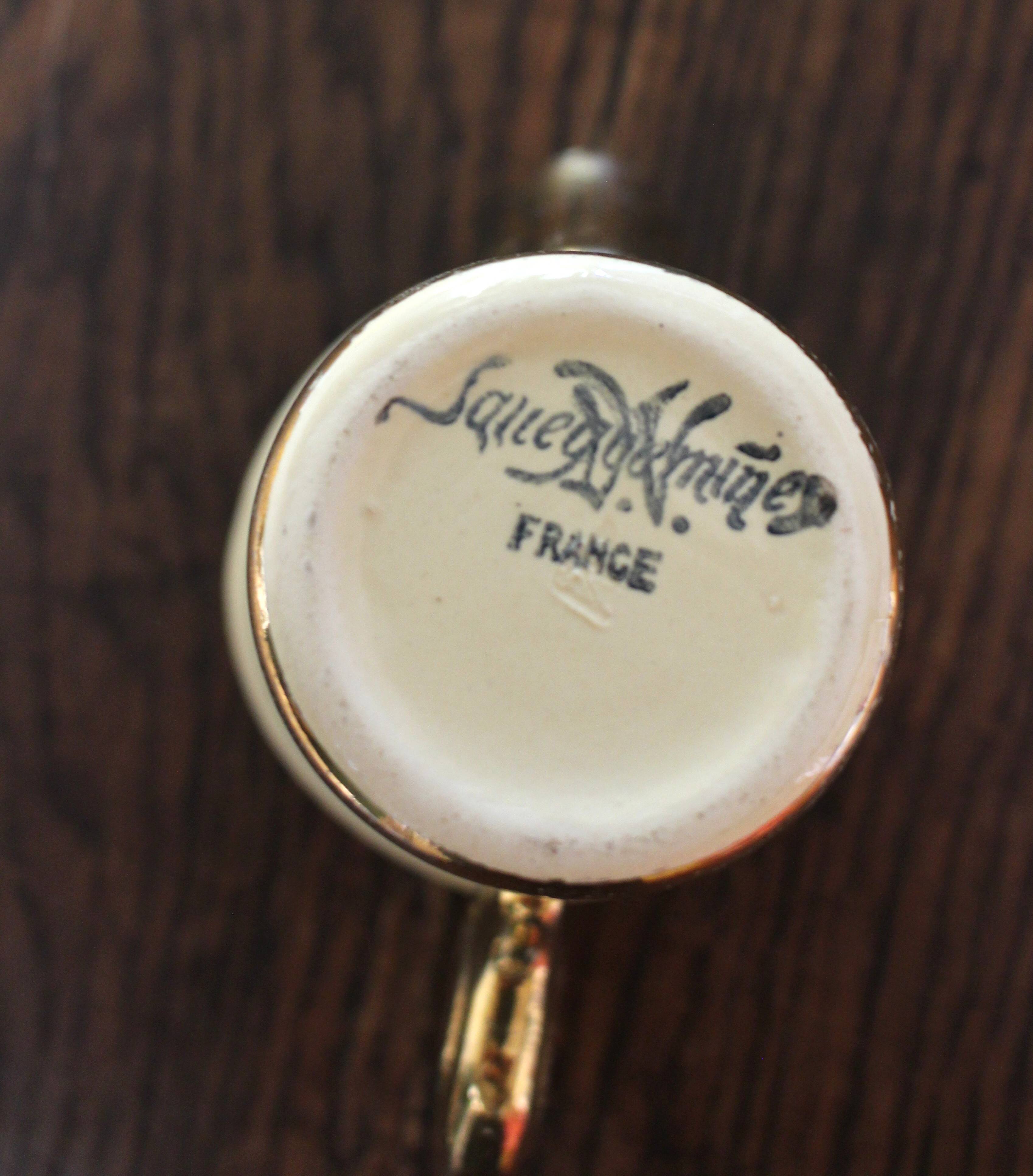 Ecru ceramic milk jug with gold decoration from Sarreguemines.