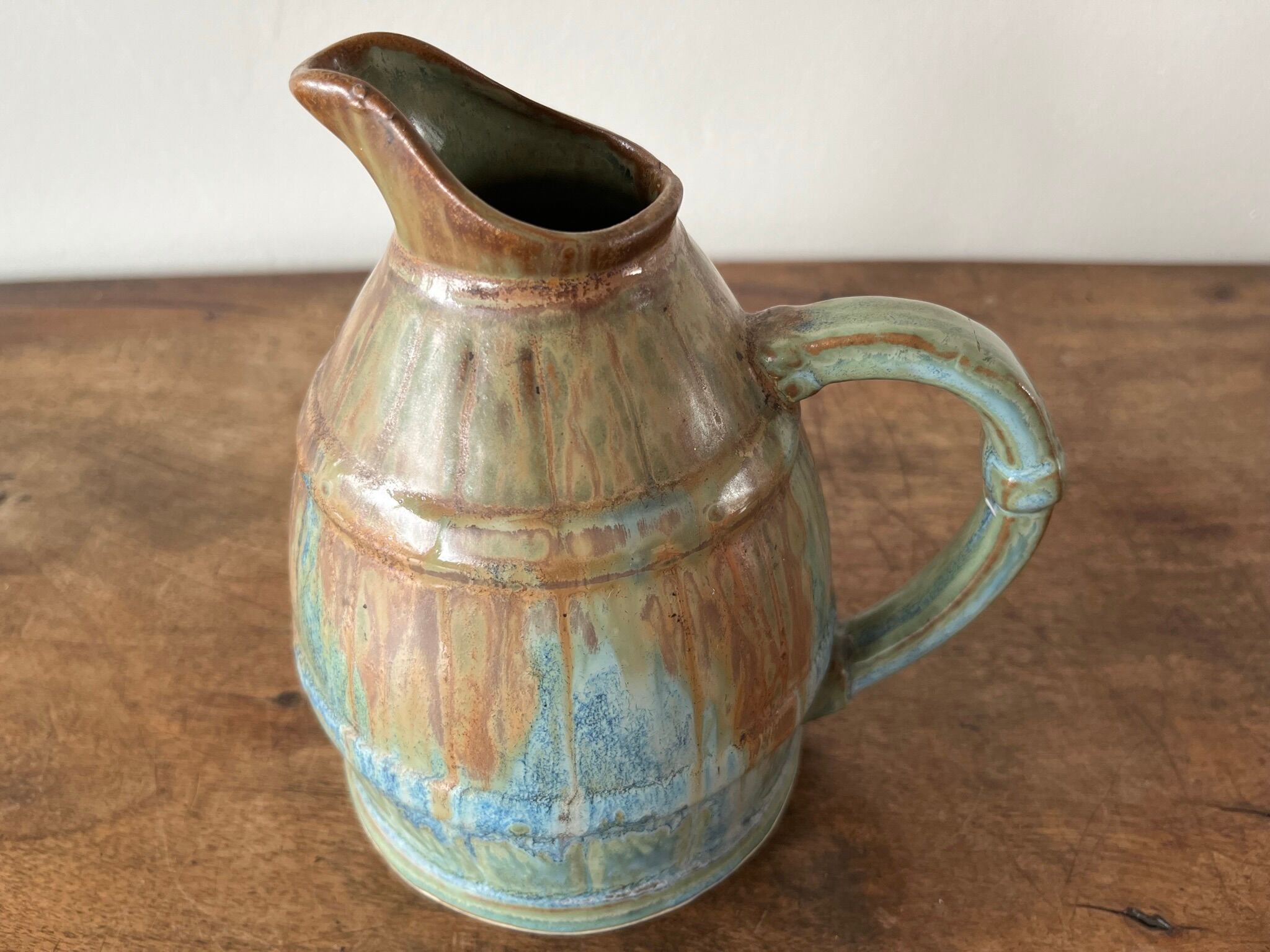 Pitcher in flamed sandstone