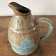 Pitcher in flamed sandstone