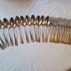 12 Art Deco forks and 12 Bouillet Bourdelle soup spoons.