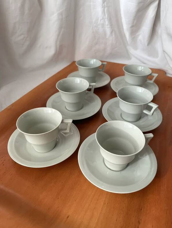 Art Deco cups and saucers by Théodore Haviland in celadon.