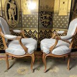 Pair of Louis XV style convertible armchairs