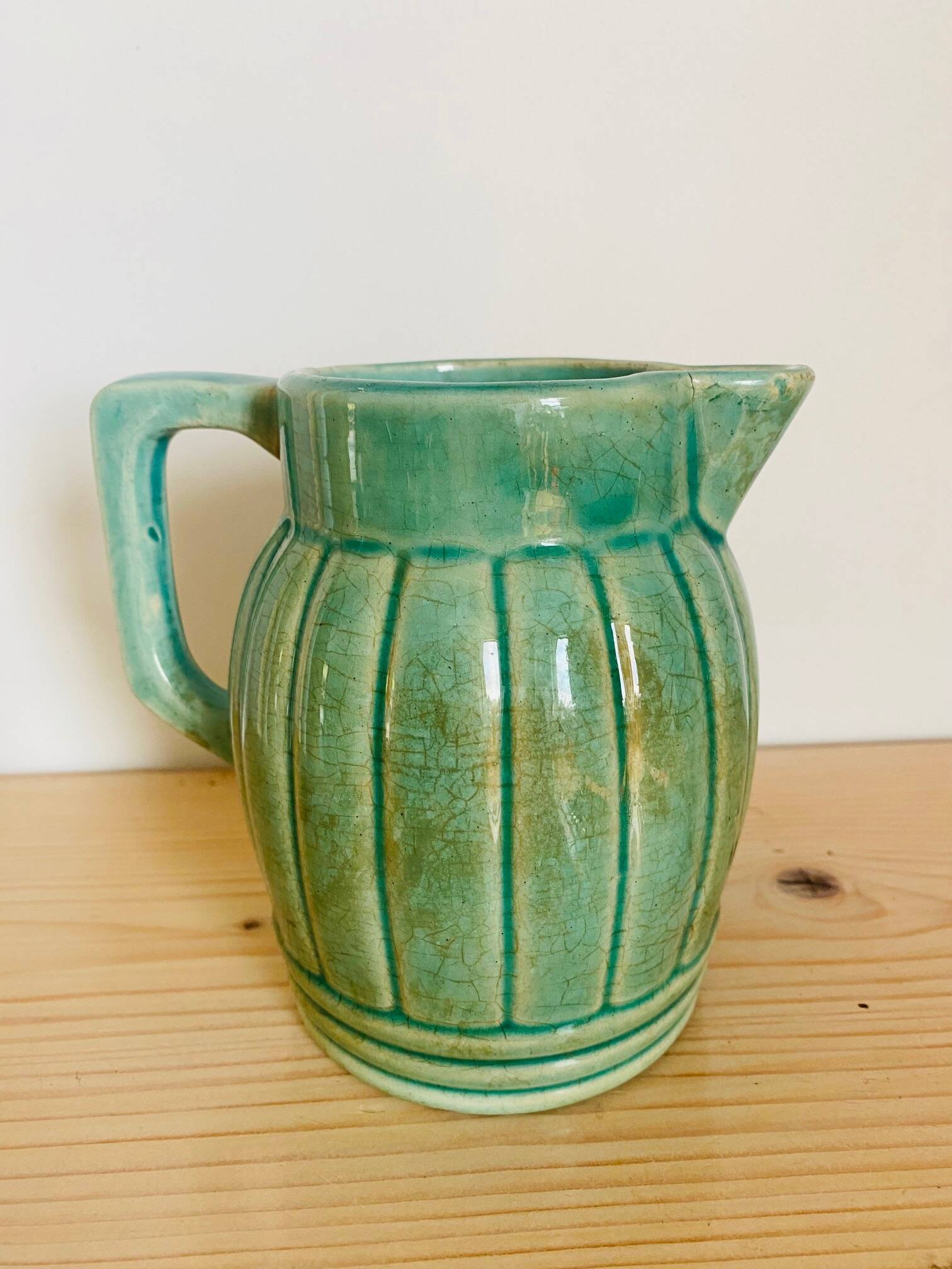 Old green pitcher Orchies No. 3