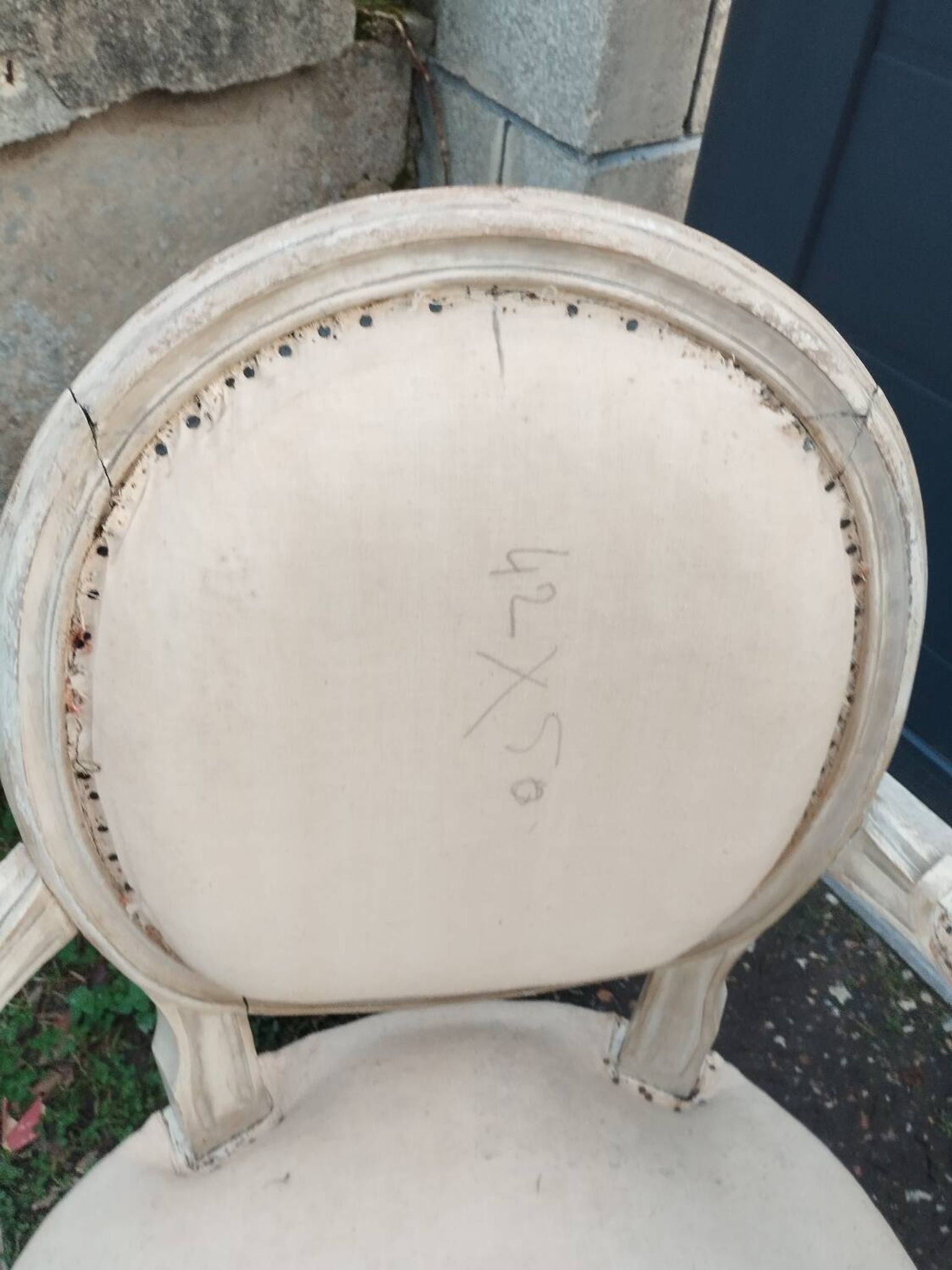 Antique armchair in Louis XVI style from the late 19th century.