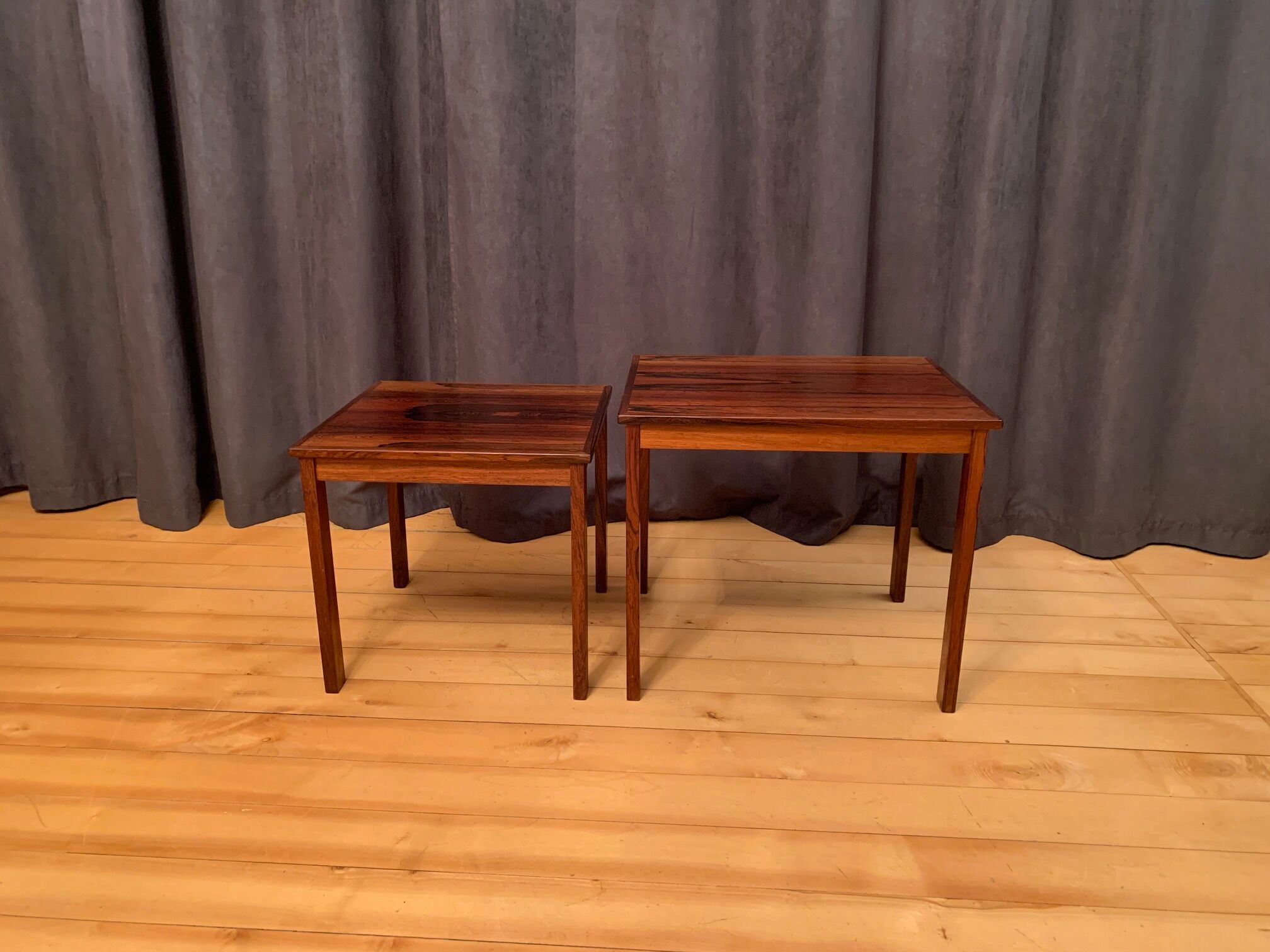 A pair of Kvalitet Form Funktion rosewood side tables Denmark 1960s
