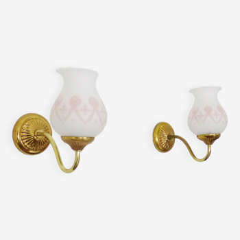 Pair of gooseneck wall sconces in gilded metal, white opaline with pink decorations