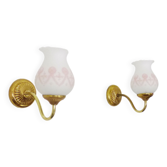 Pair of gooseneck wall sconces in gilded metal, white opaline with pink decorations