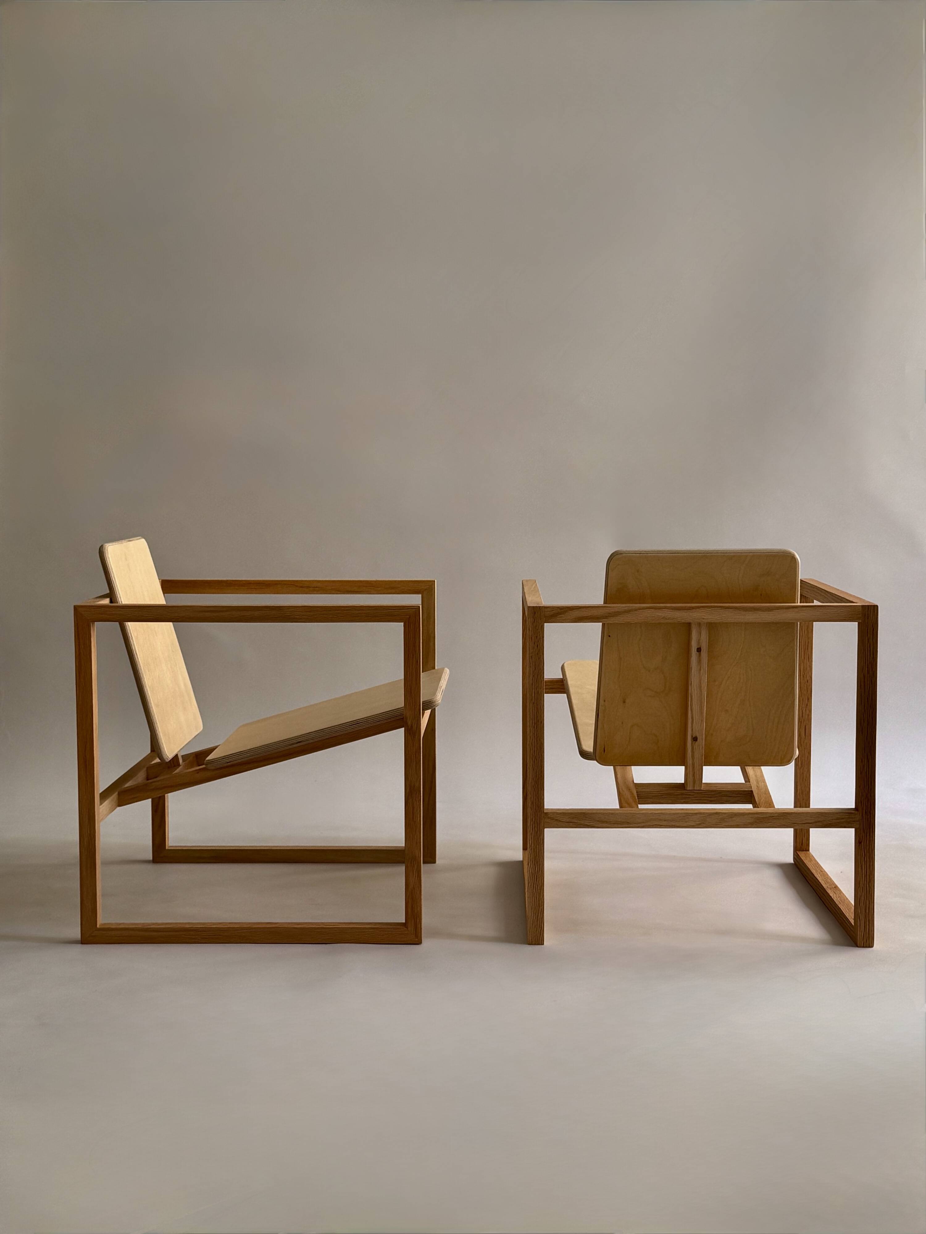 Pair of handmade wooden armchairs