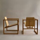 Pair of handmade wooden armchairs