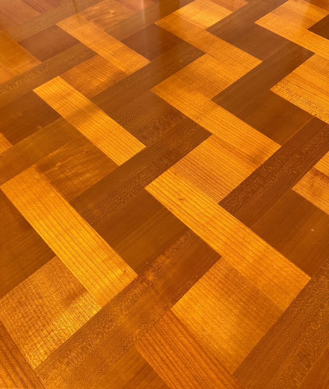 Antique extendable table in cherry wood and marquetry in the Louis XV style.