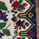 White vintage floral rug made by hand in Romania, beautiful flowers