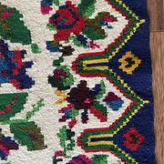 White vintage floral rug made by hand in Romania, beautiful flowers