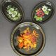 Set of three painted sheet metal trays