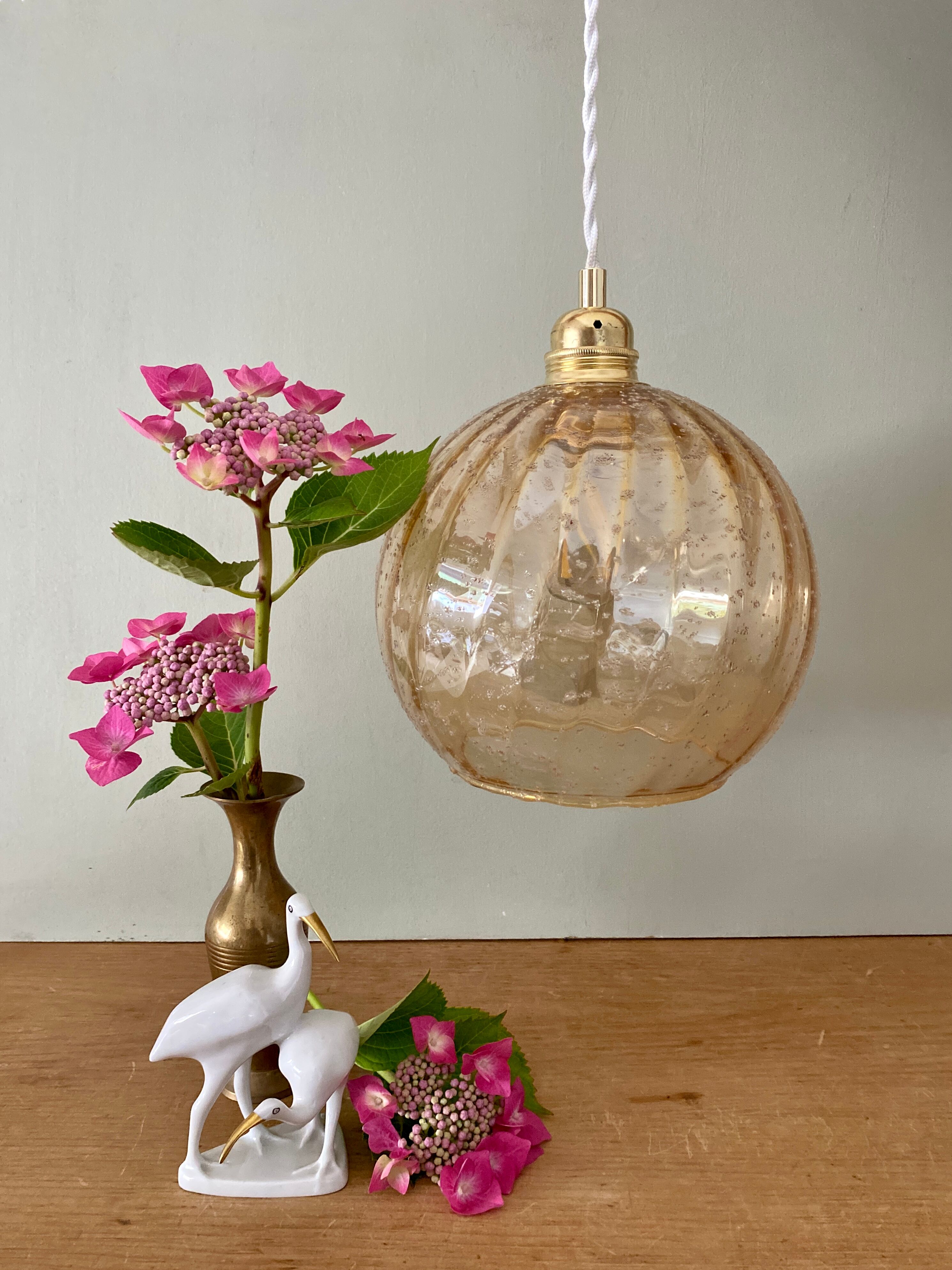 Vintage globe pendant lamp in amber glass