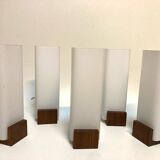 Many Louis Kallf wall lights.