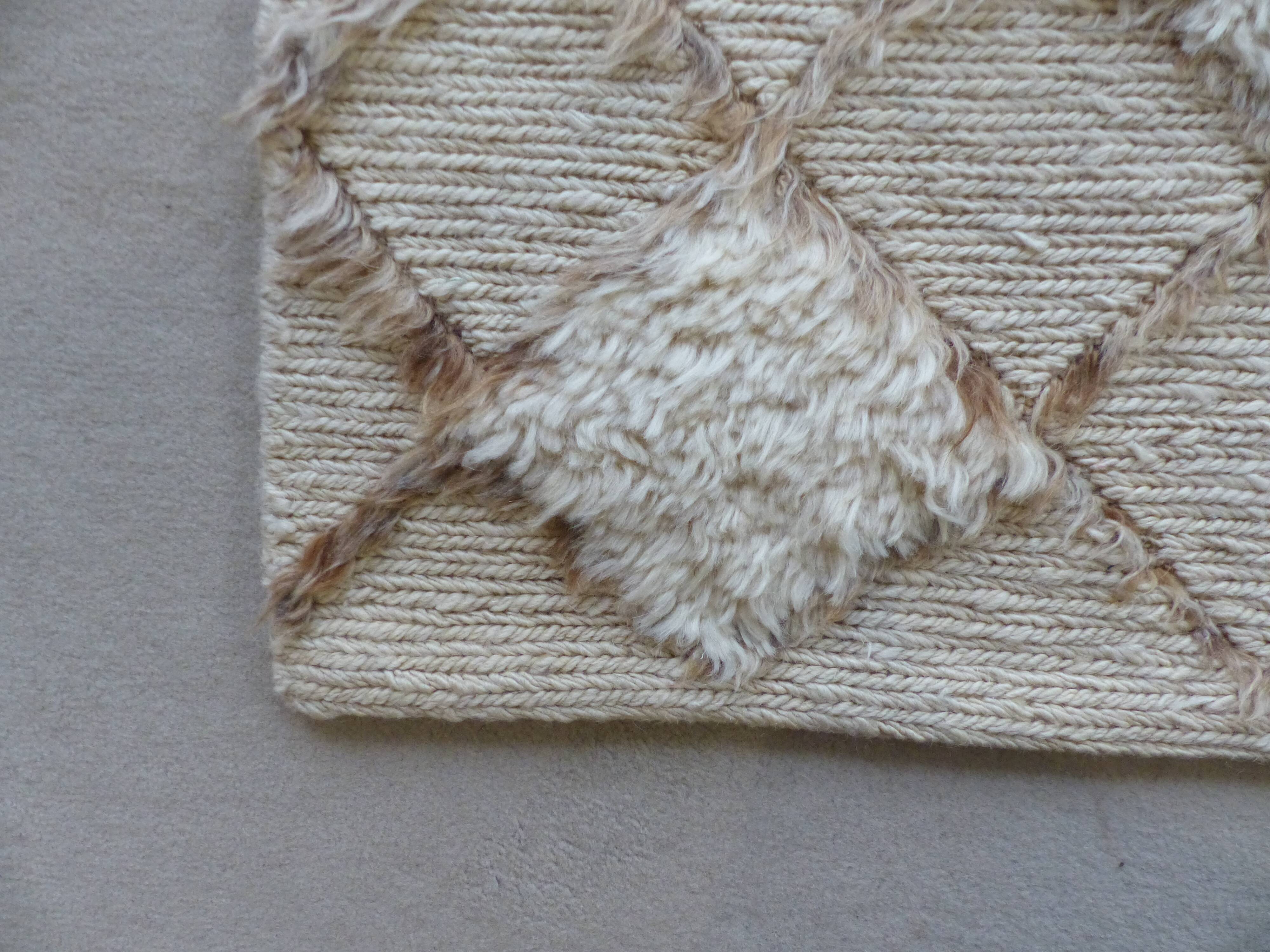 Ivory hand woven and knotted carpets