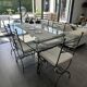Roche Bobois glass and steel dining table and 6 chairs
