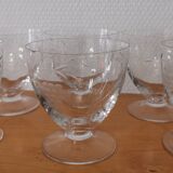 Set of 8 old glasses on foot chiseled decoration