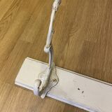 Wall coat door patère