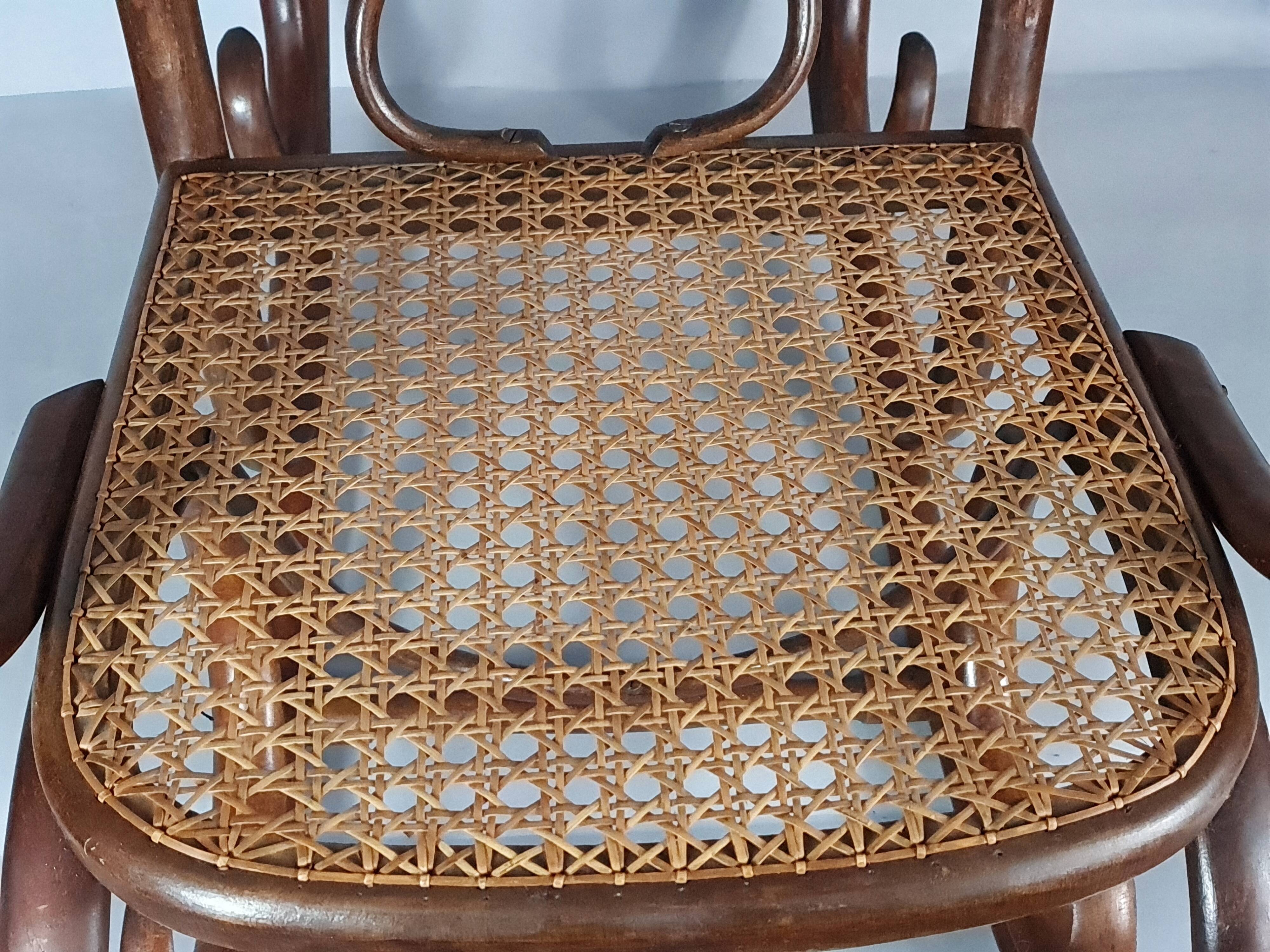 Vintage curved wood rocking chair for children with recent caning model D912.