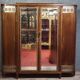 Large Art Deco bookcase wardrobe in mahogany and bronze.