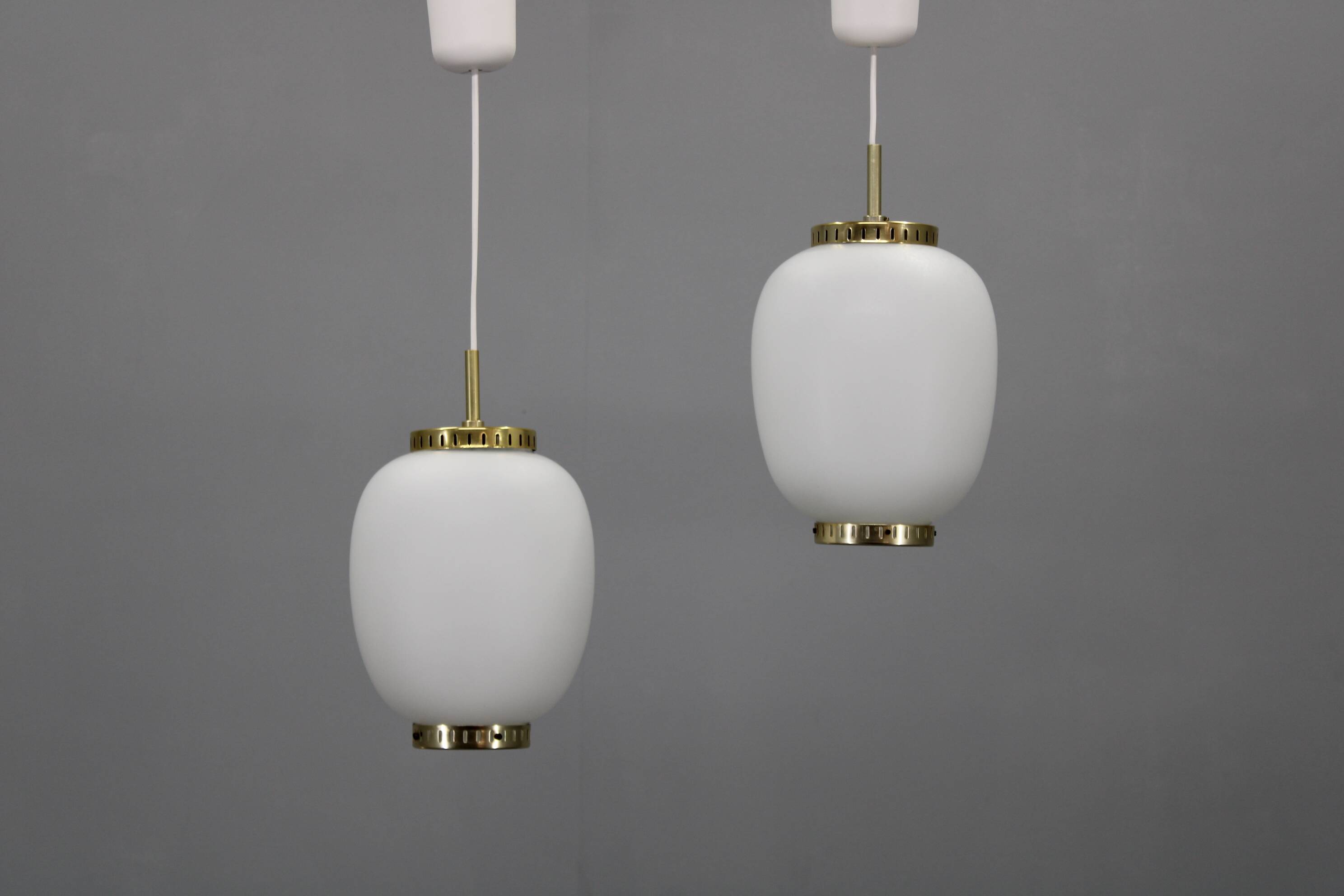1970s Bent Karlby Pair of China Pendants of Opaline Glass and Brass by Lyfa