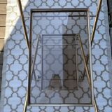 Golden dessert with wheeled glass tray