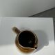 Small two-tone white and brown pitcher Made in China