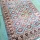 Old handmade wool oriental rug. 190 x 126cm