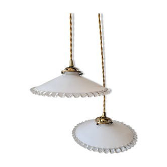 Duo of serrated opaline suspensions