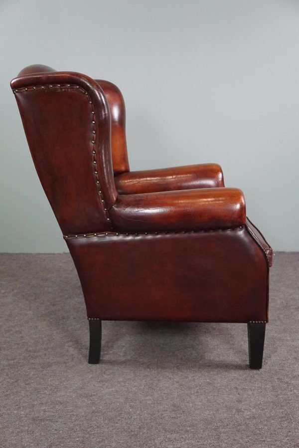 Patinated sheepskin armchair