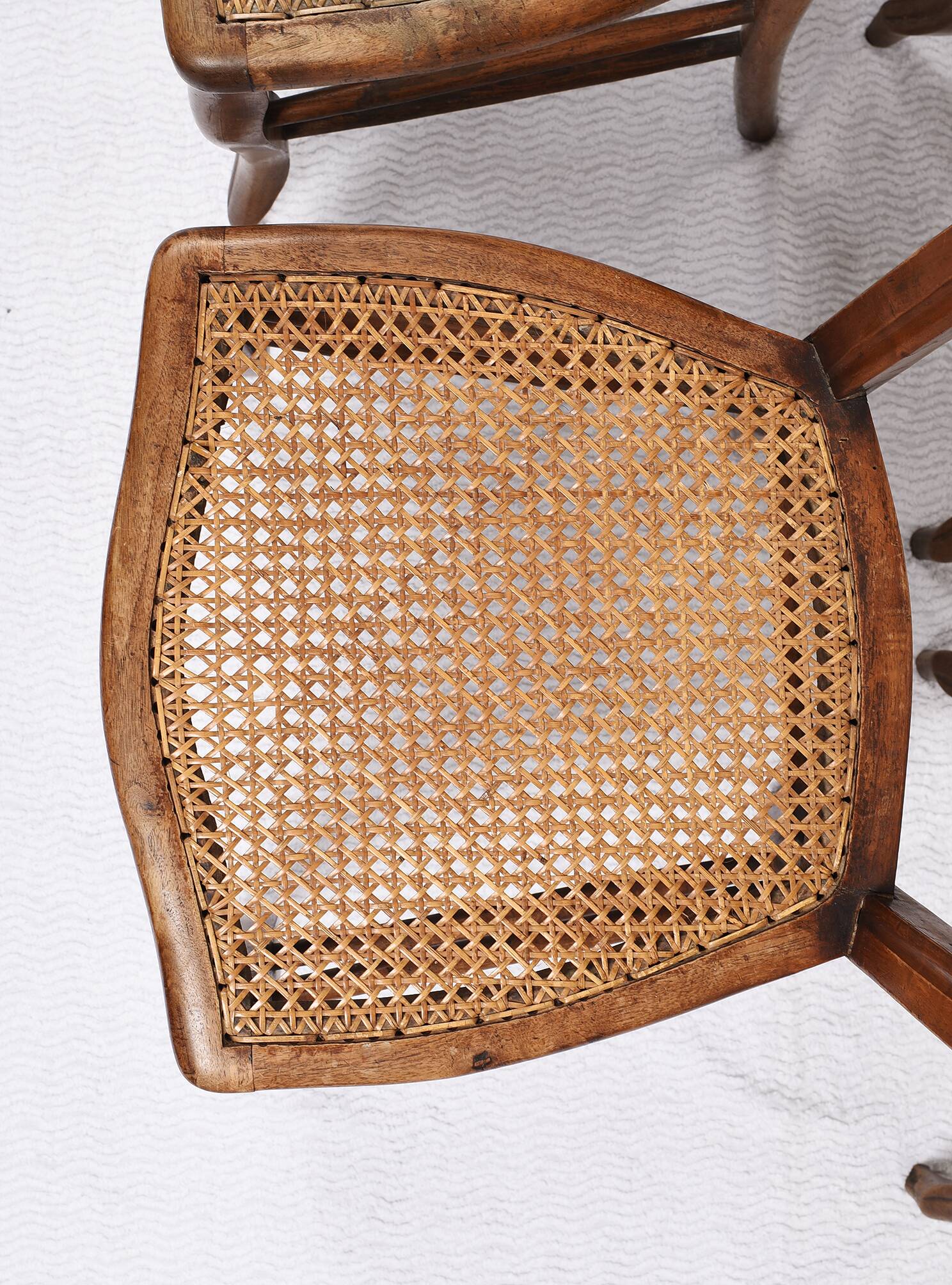 Set of 5 old cane chairs.