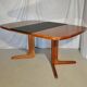 Scandinavian expandable central square table in teak