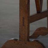 19th-century French round wine table with an adjustable top and floral textile surface.