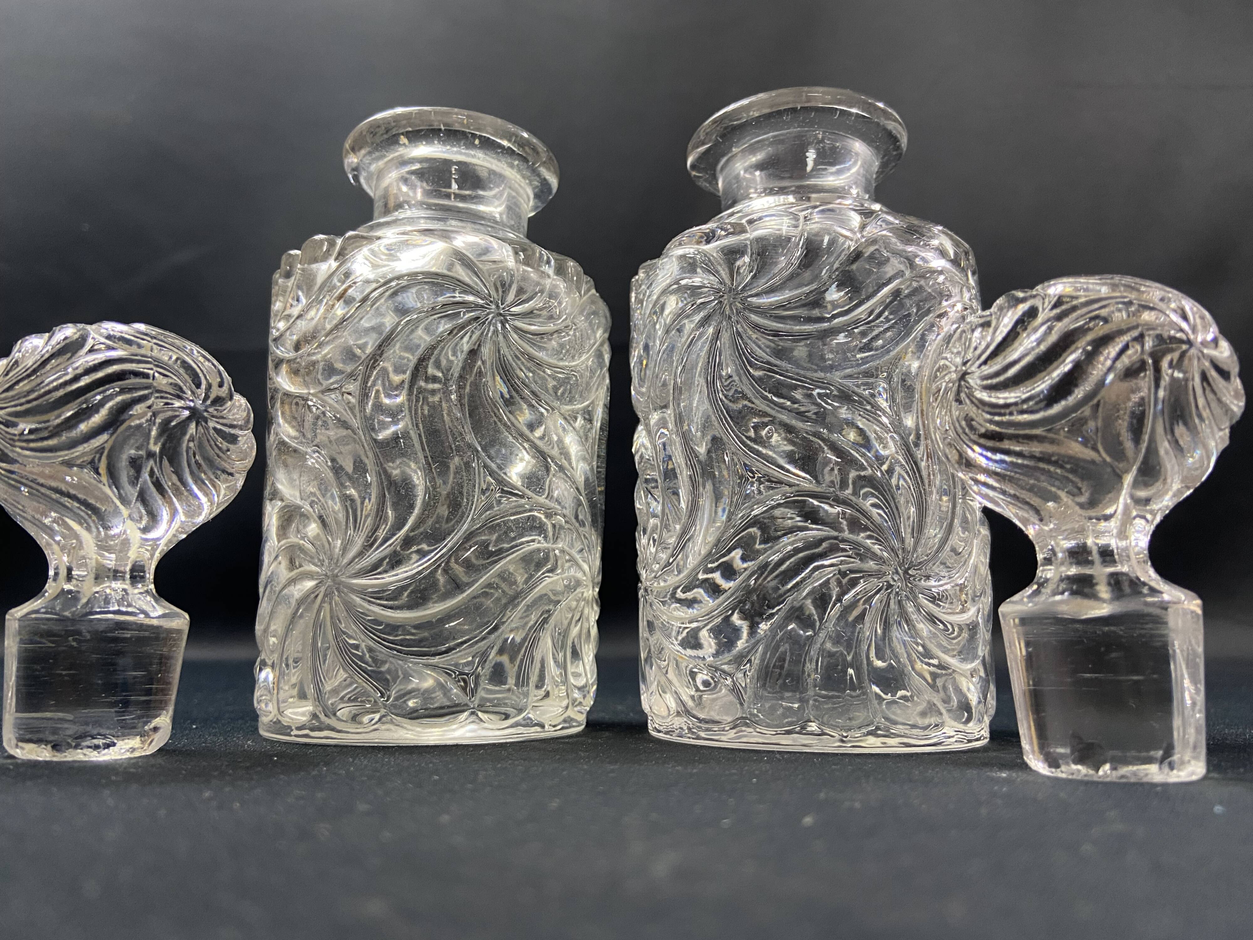 Pair of early 20th century SAINT LOUIS crystal perfume bottles, Fleurs de viole model