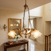 Lustre aux angelots en bronze années 70