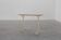20th century French bistro table with cast iron base and oak top