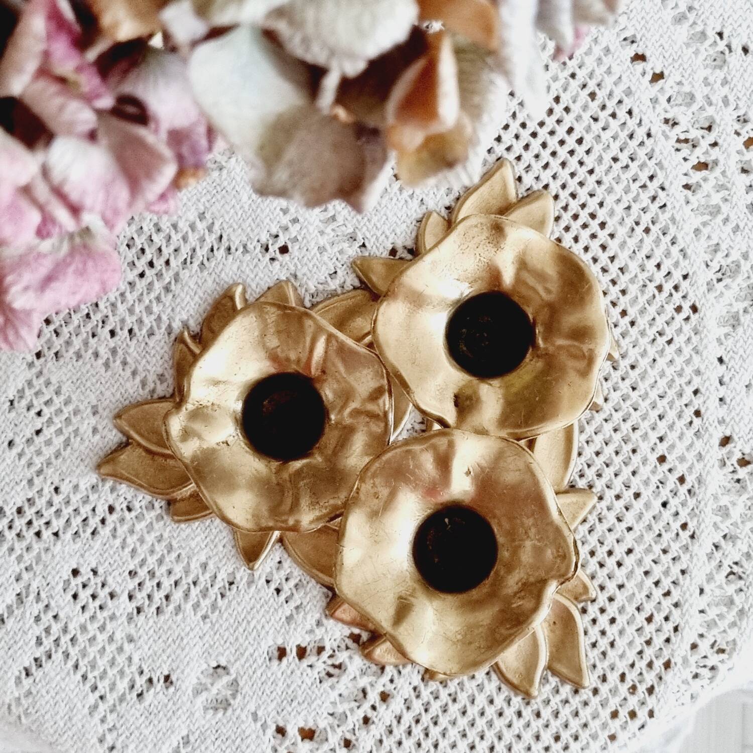 Low brass flower candle holder