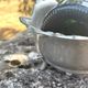 Footed pewter champagne cooler on claw feet with floral relief