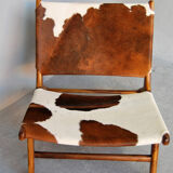 Chair in cowhide with ottoman inspiration Norwegian