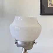 Vintage globe lamp in white opaline glass and chrome metal.