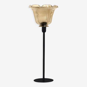 Table lamp with a vintage lampshade with golden highlights