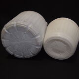 Pair of white covered demijohns